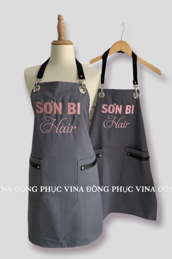 tạp dề tiệm cắt tóc Sơn Bi