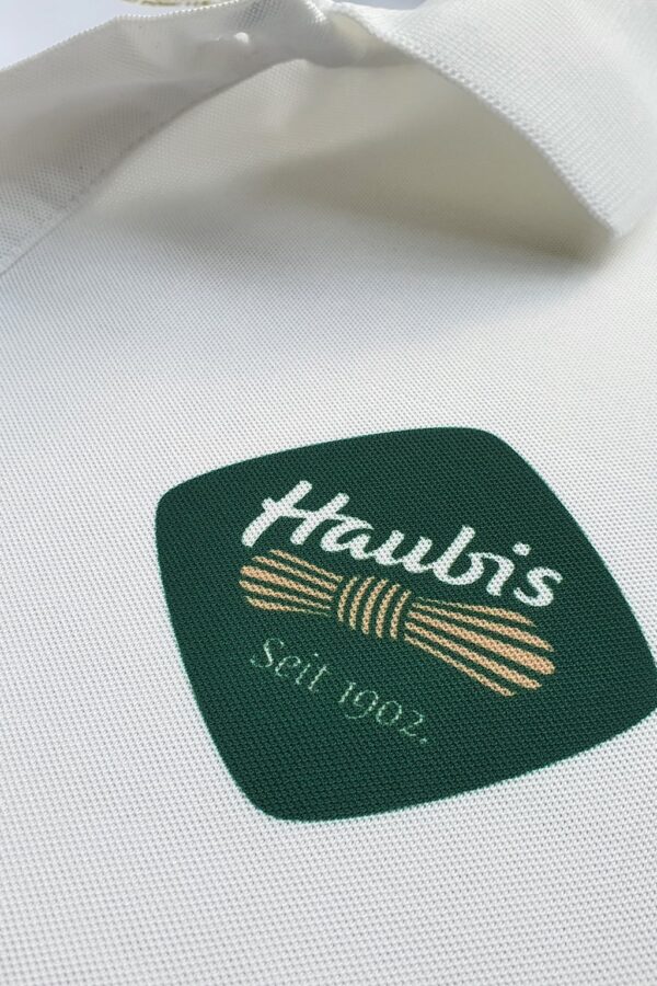 In logo lên áo đồng phục Haubis