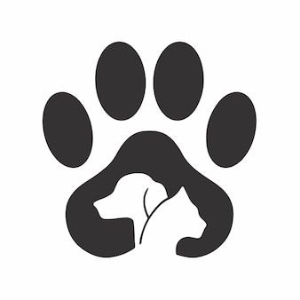 Premium Vector Pet shop logo design with dog and cat in the middle of dog paws animal stencil vector illustration