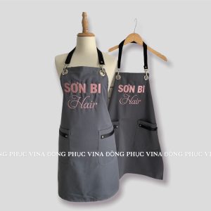 Tạp dề tiệm cắt tóc Sơn Bi màu xám